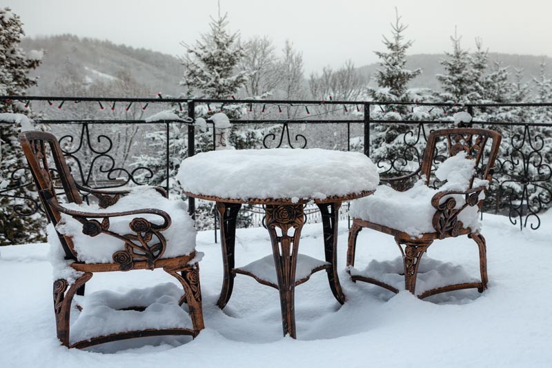 outdoor-furniture-covered-in-snow
